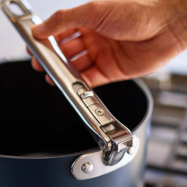 Space Cookware Blue Saucepan Showing Folding Handle Mechanism | Joseph Joseph