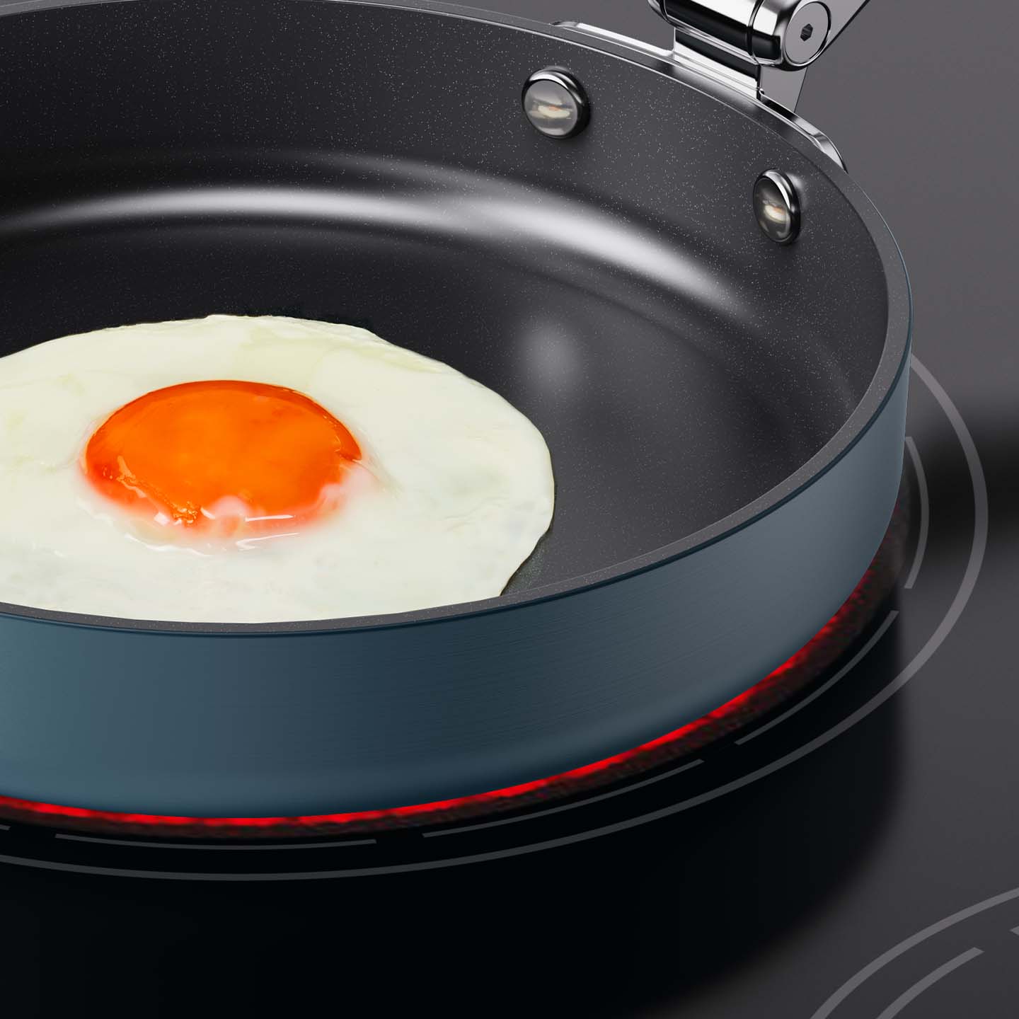 Space Cookware Blue Frying Pan Cooking Egg on Induction Hob | Joseph Joseph